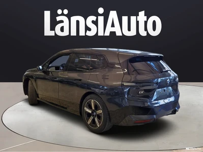 BMW iX xDrive50 2025, photo 6/8