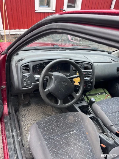 Nissan Primera 1997, photo 6/8