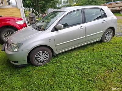 Toyota Corolla Hatchback 2002, photo 3/9
