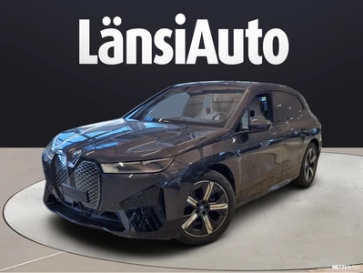 BMW iX xDrive50 2025, photo 1/8