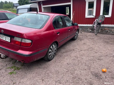 Nissan Primera 1997, photo 4/8