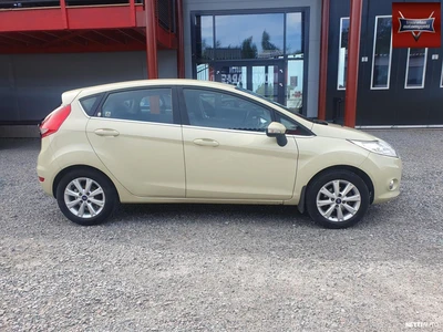 Ford Fiesta 1.4TDCi Ghia 5-ov 2009, photo 6/26
