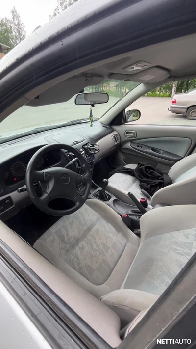 Nissan Almera 2006, photo 2/8