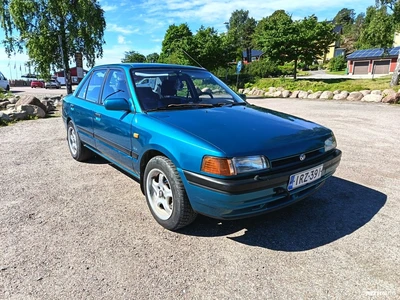 Mazda 323 GLX 1993, photo 4/5