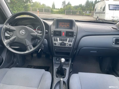 Nissan Almera 1,5 Luxury 4-ov. 2004, photo 5/6