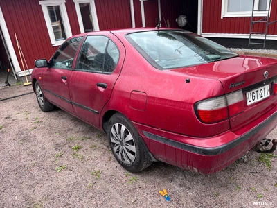 Nissan Primera 1997, photo 2/8