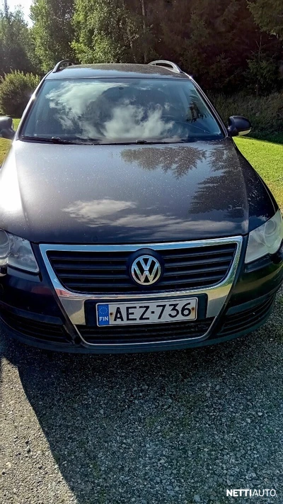 Volkswagen Passat 2009, kuva 1/10