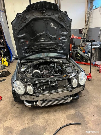 Mercedes-Benz E 2004, photo 6/9