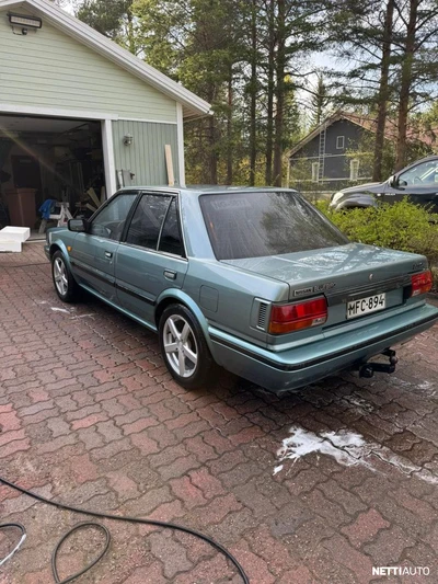 Nissan Bluebird 1990, kuva 1/6